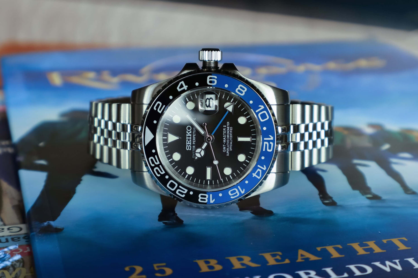 Seiko GMT-Master 2 Batgirl Mod Watch with a black dial and 40mm stainless steel case, designed for luxury and precision.