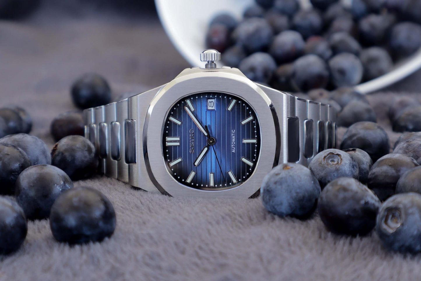 Seiko Nautilus Mod Watch with a blue dial and 41mm stainless steel case, designed for luxury and precision.