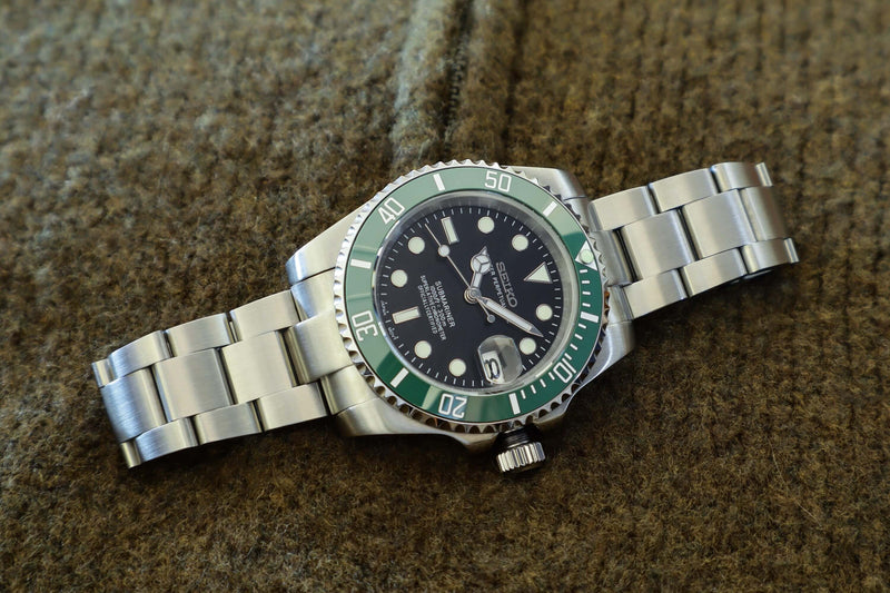 Seiko Submariner Mod Watch with a black dial and 40mm stainless steel case, designed for luxury and precision.